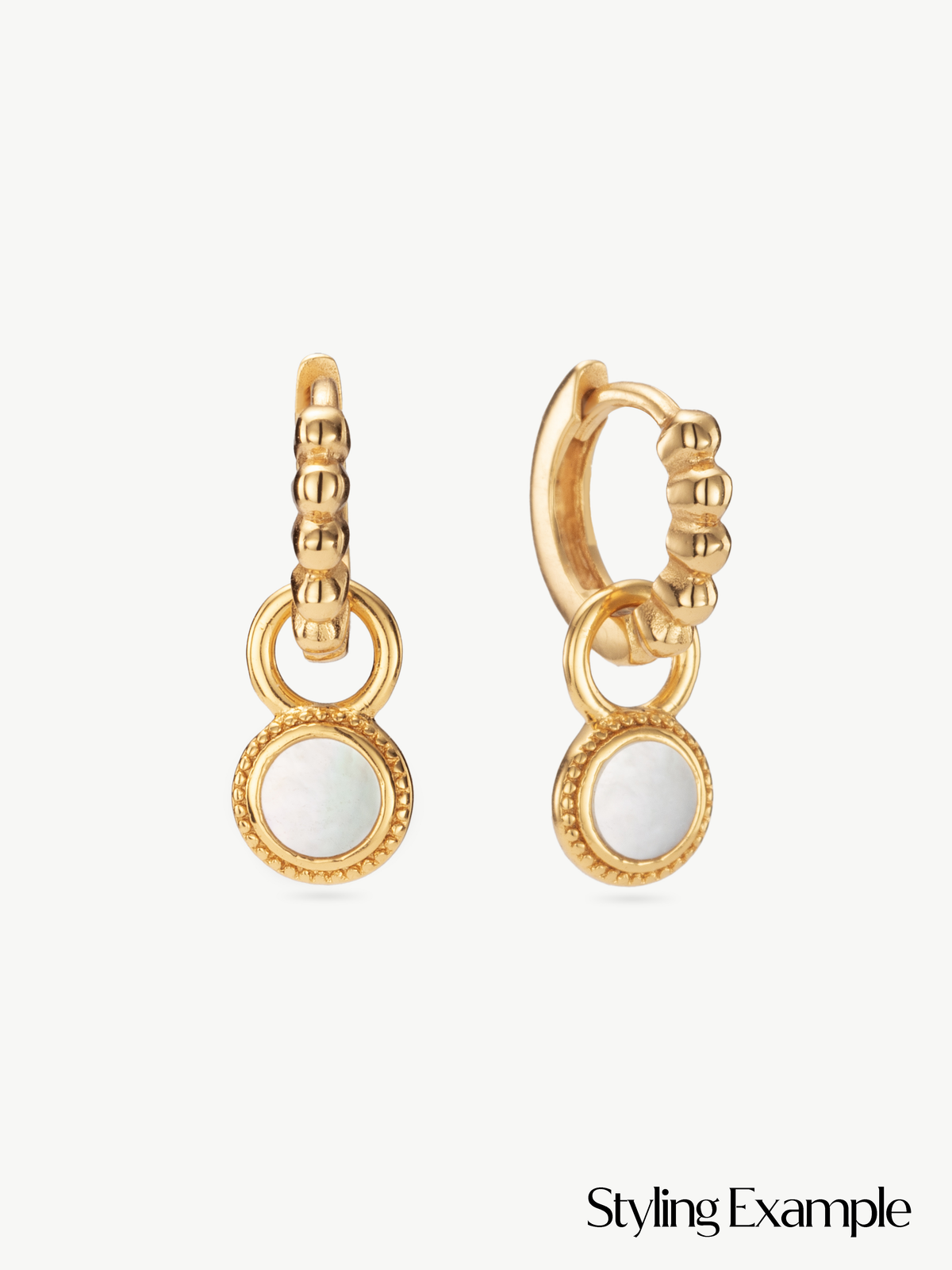 Beaded huggie hoops with mother of pearl Fontana earring charms in gold vermeil