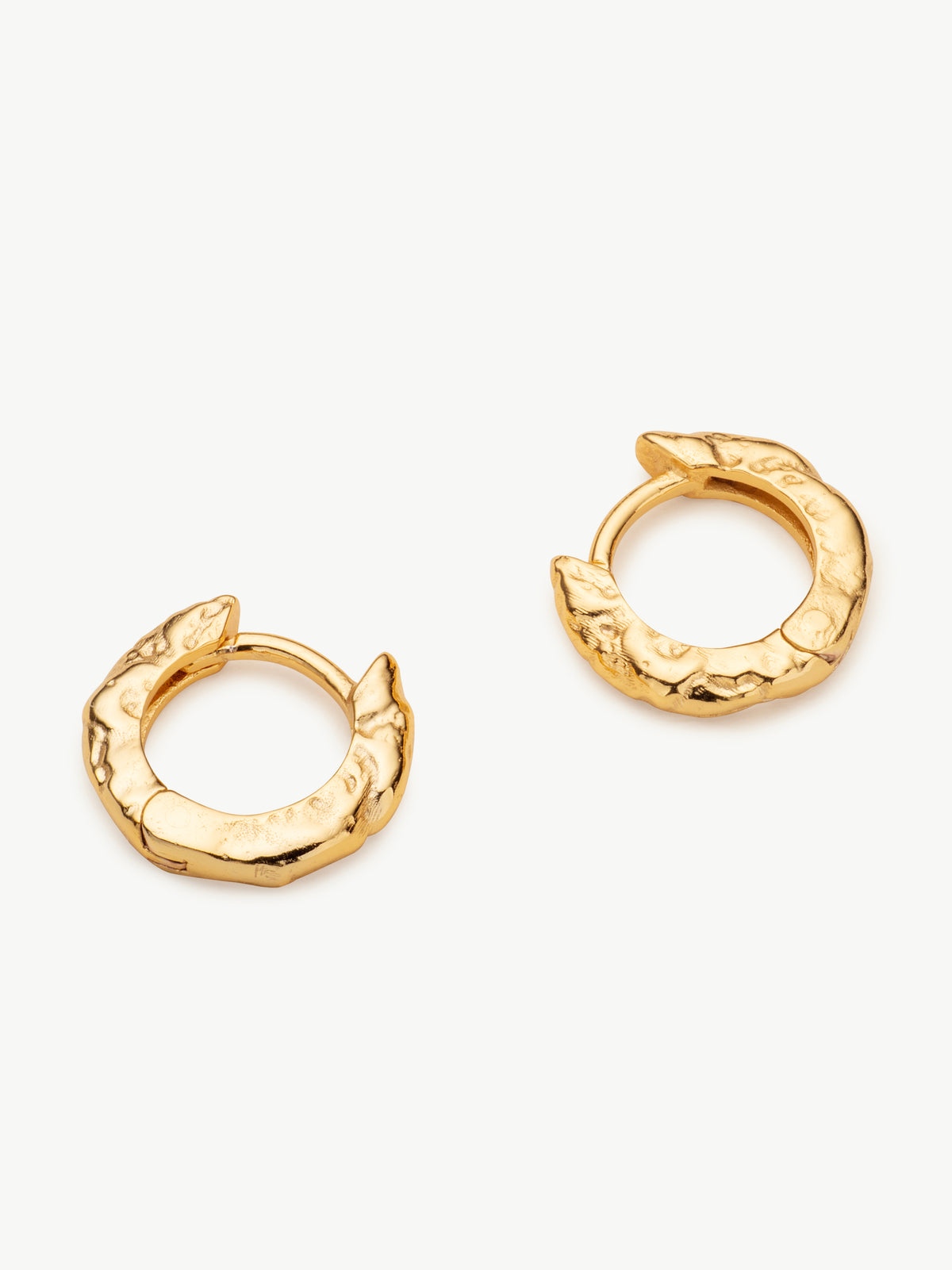 Molten Huggie Hoops in gold vermeil