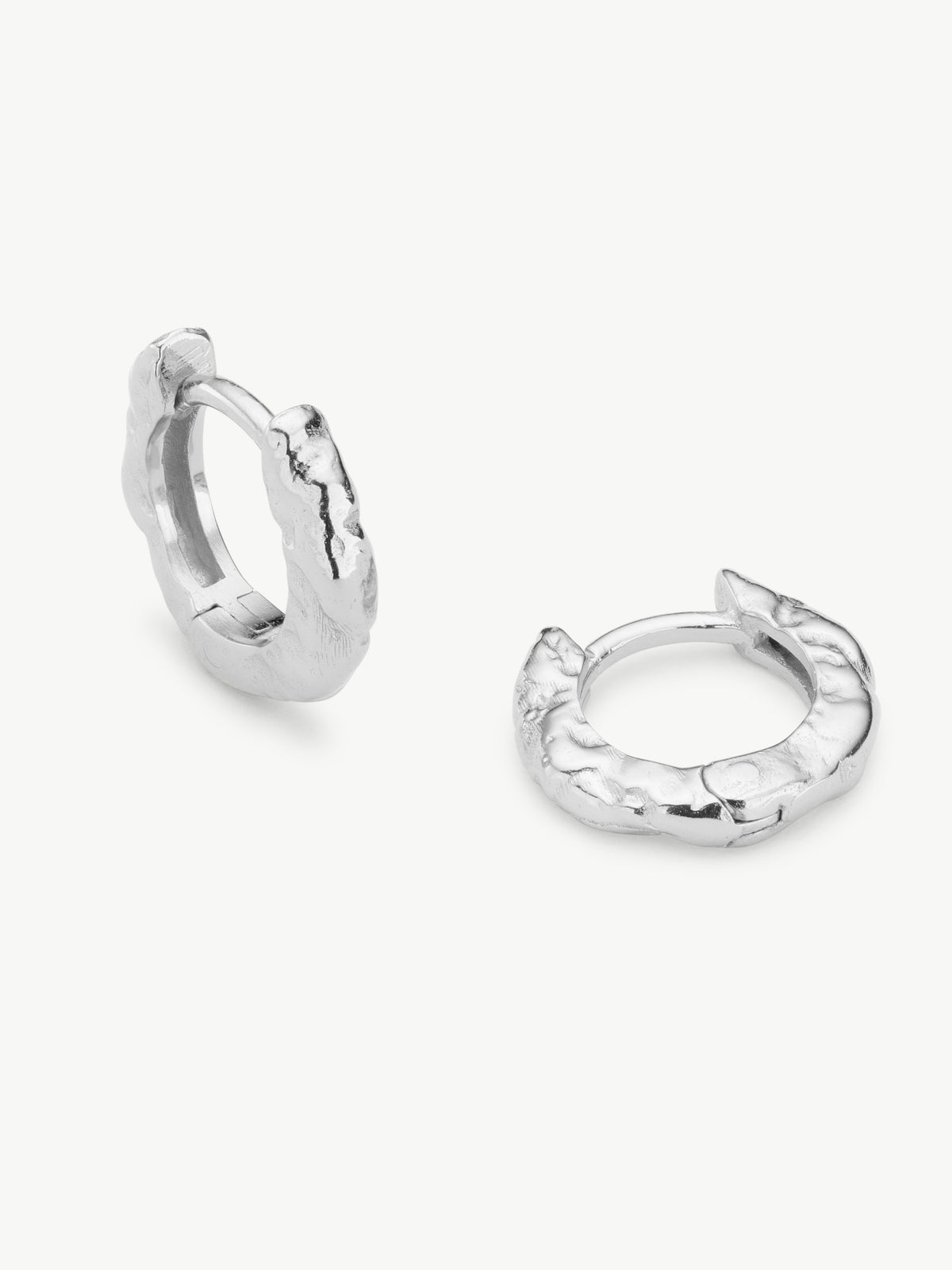 Molten Huggie Hoops in sterling silver