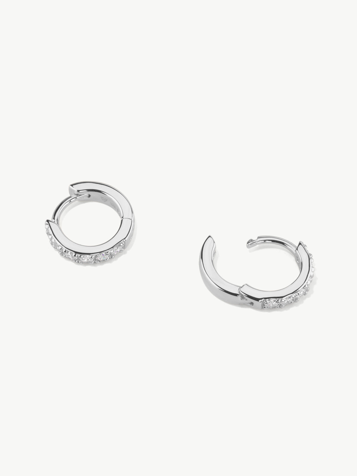 lab diamond huggie hoops in sterling silver side view