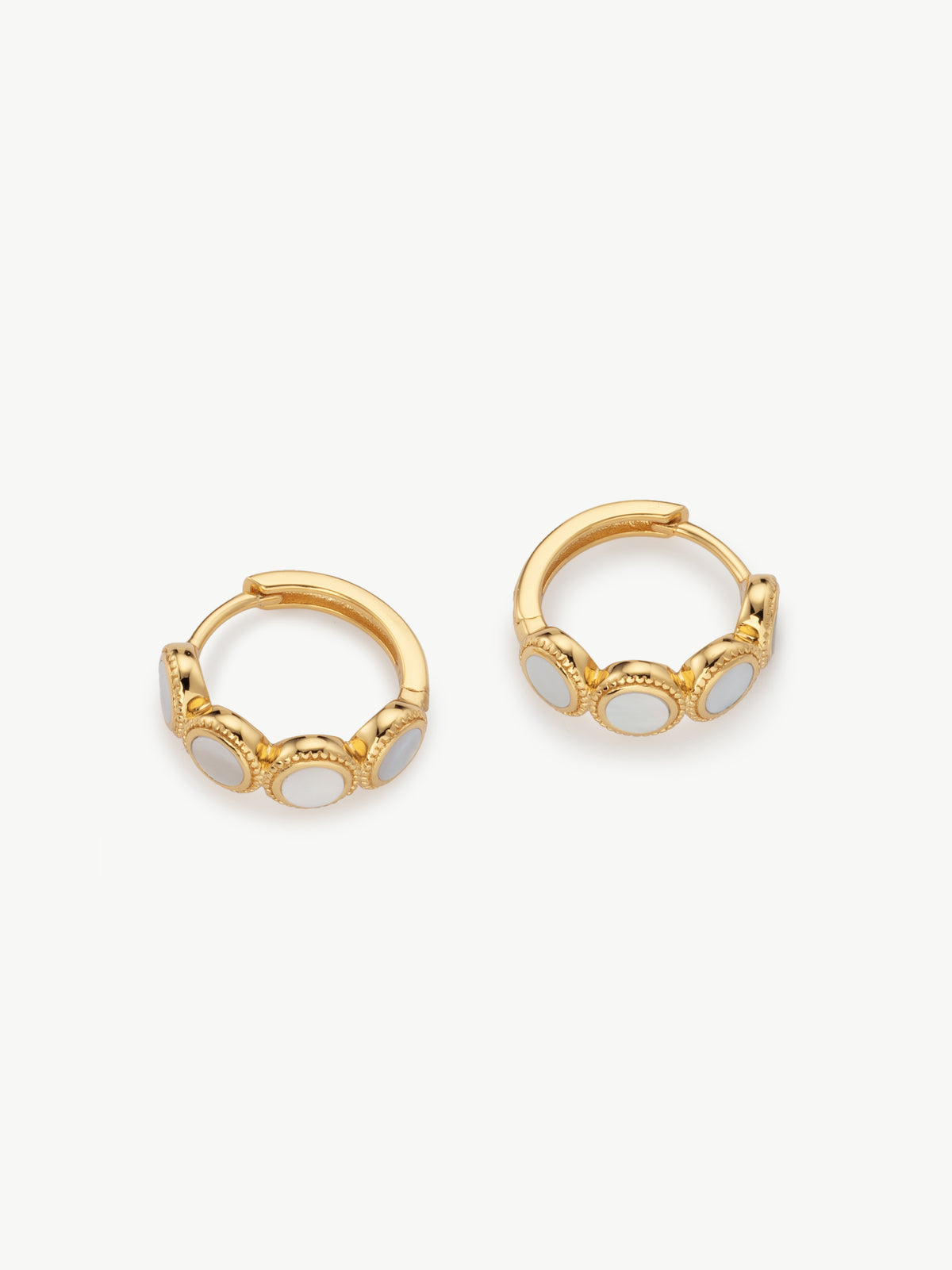 mother of pearl Fontana huggie hoops in gold