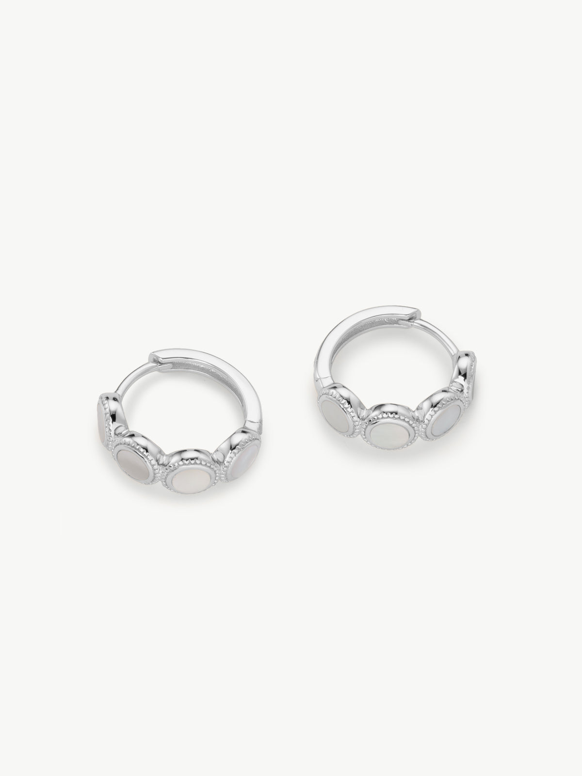 mother of pearl Fontana huggie hoops in silver
