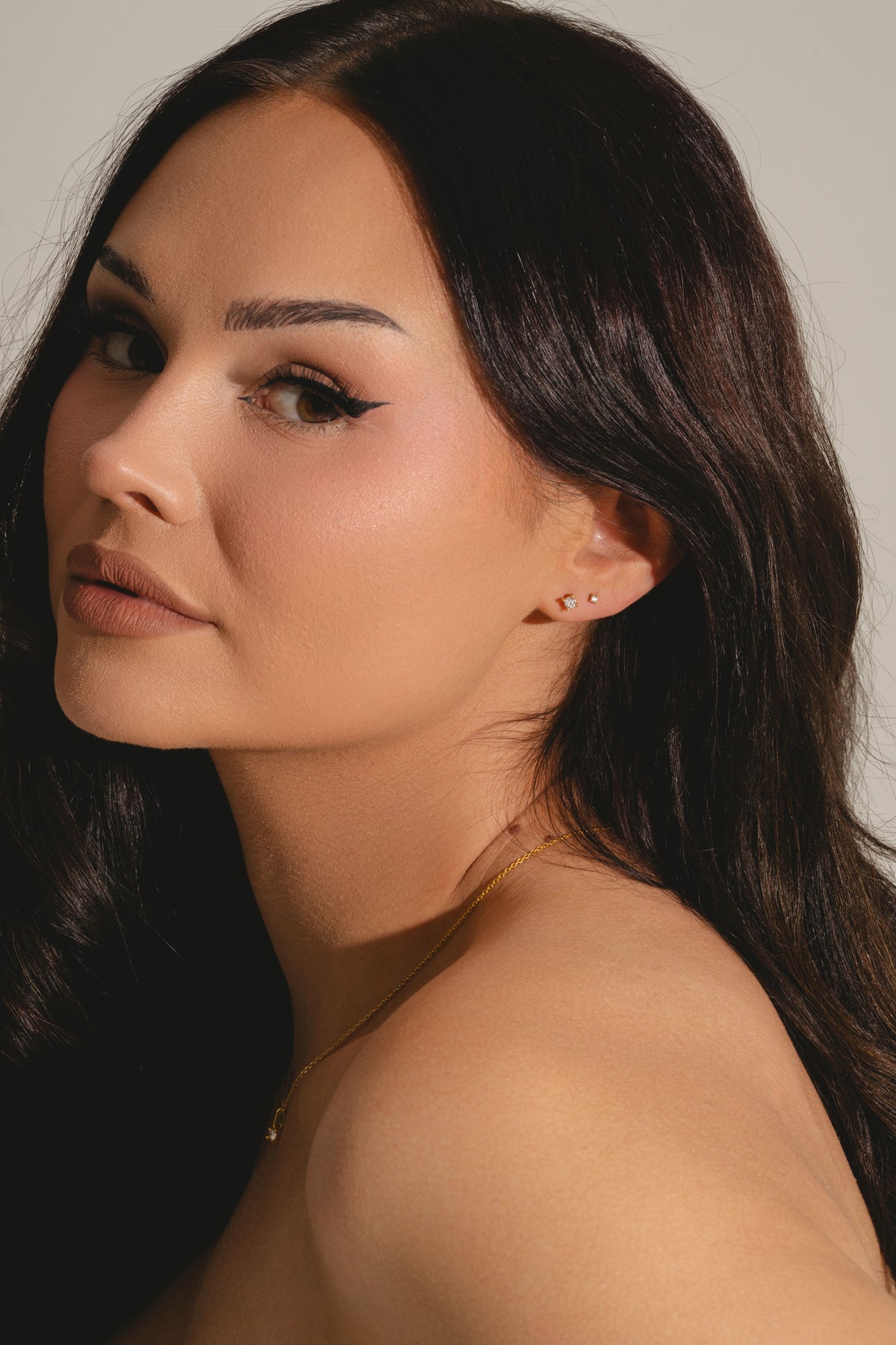 Minidiamond studs in gold vermeil on Talia Mar