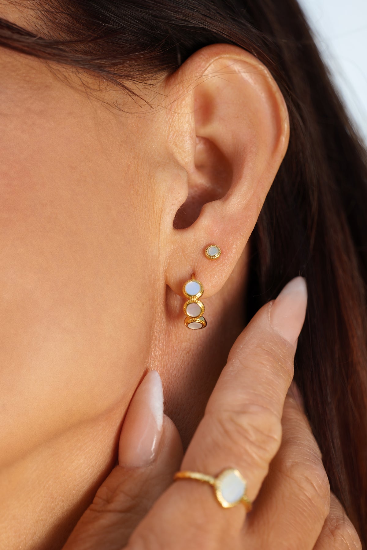 mother of pearl Fontana huggie hoops in gold