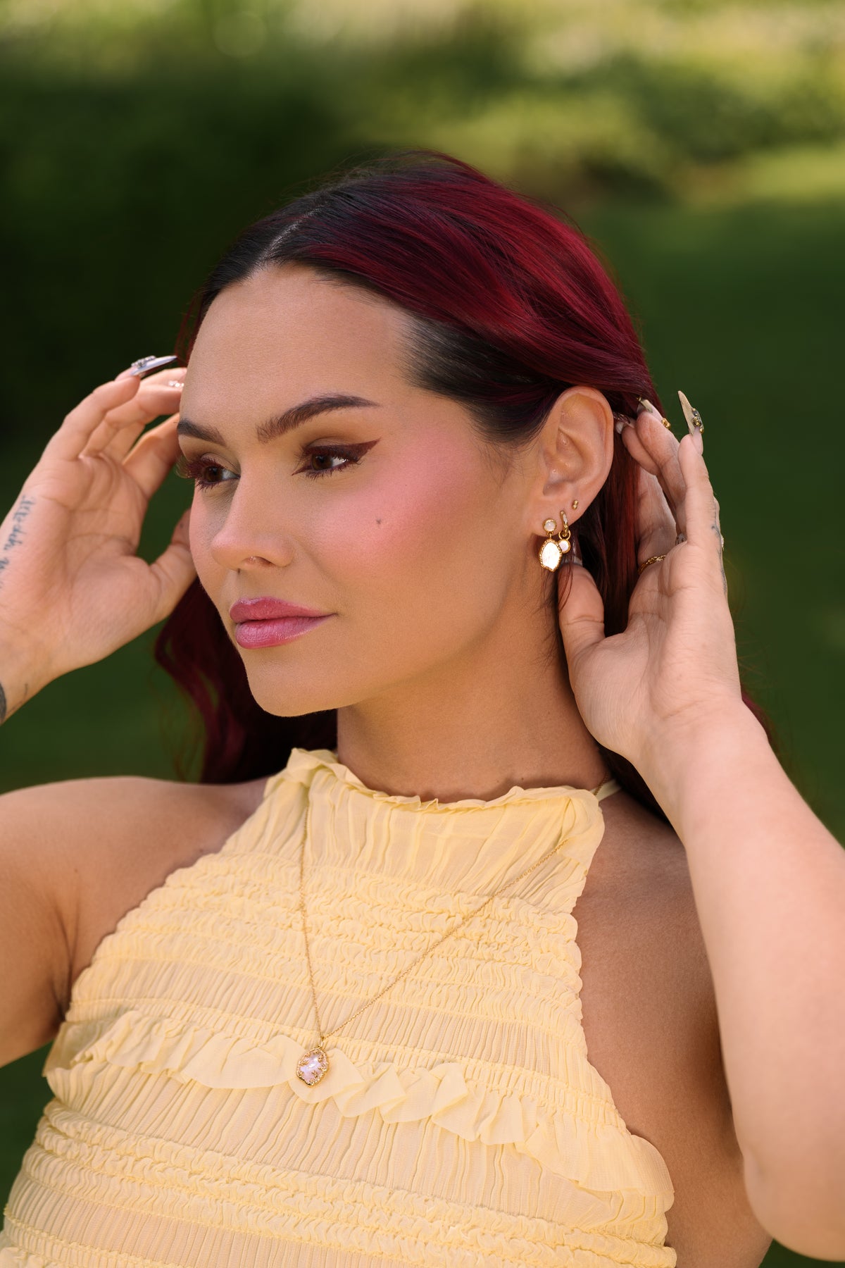 Talia Mar wearing L'ERA Jewellery