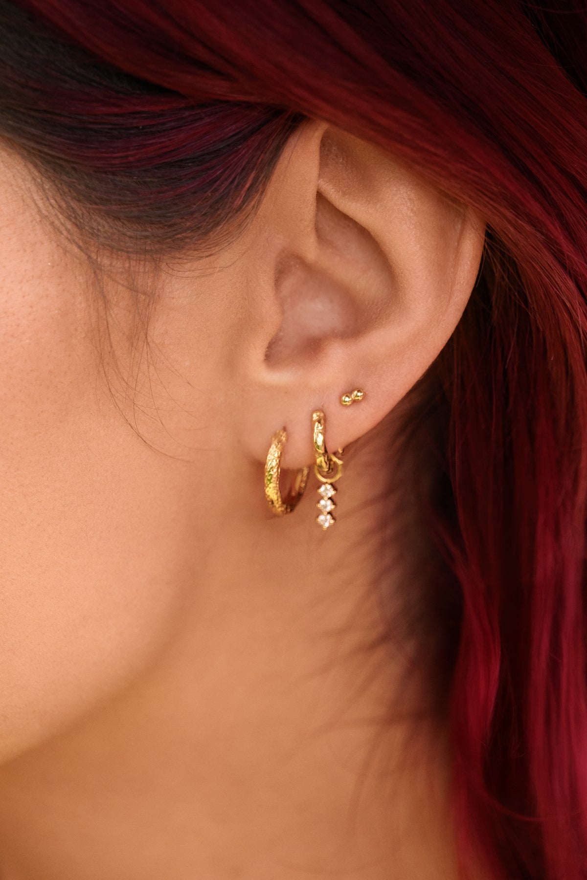Gold vermeil ear stack worn by Talia Mar