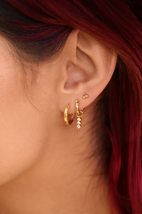 Gold vermeil ear stack worn by Talia Mar