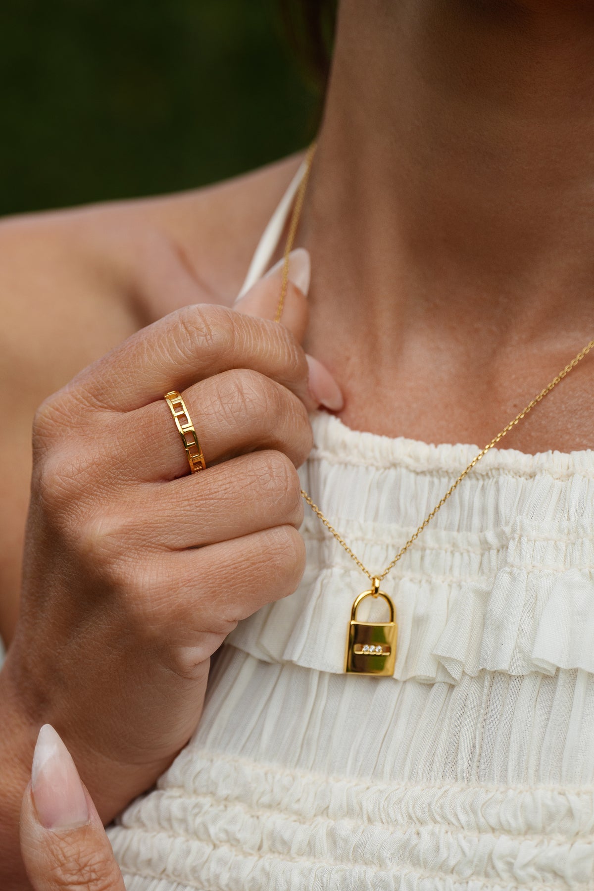 Girl wearing Diamond padlock pendant in 18ct gold vermeil 