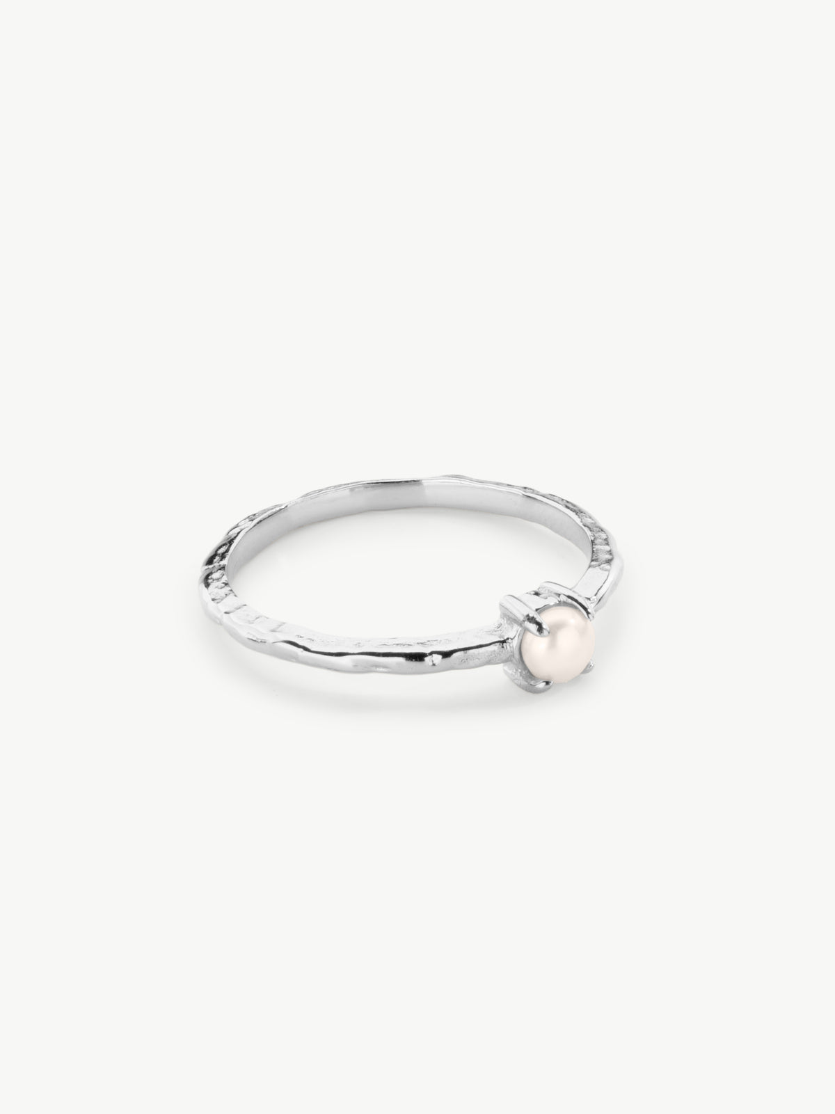 Claw set pearl ring in silver
