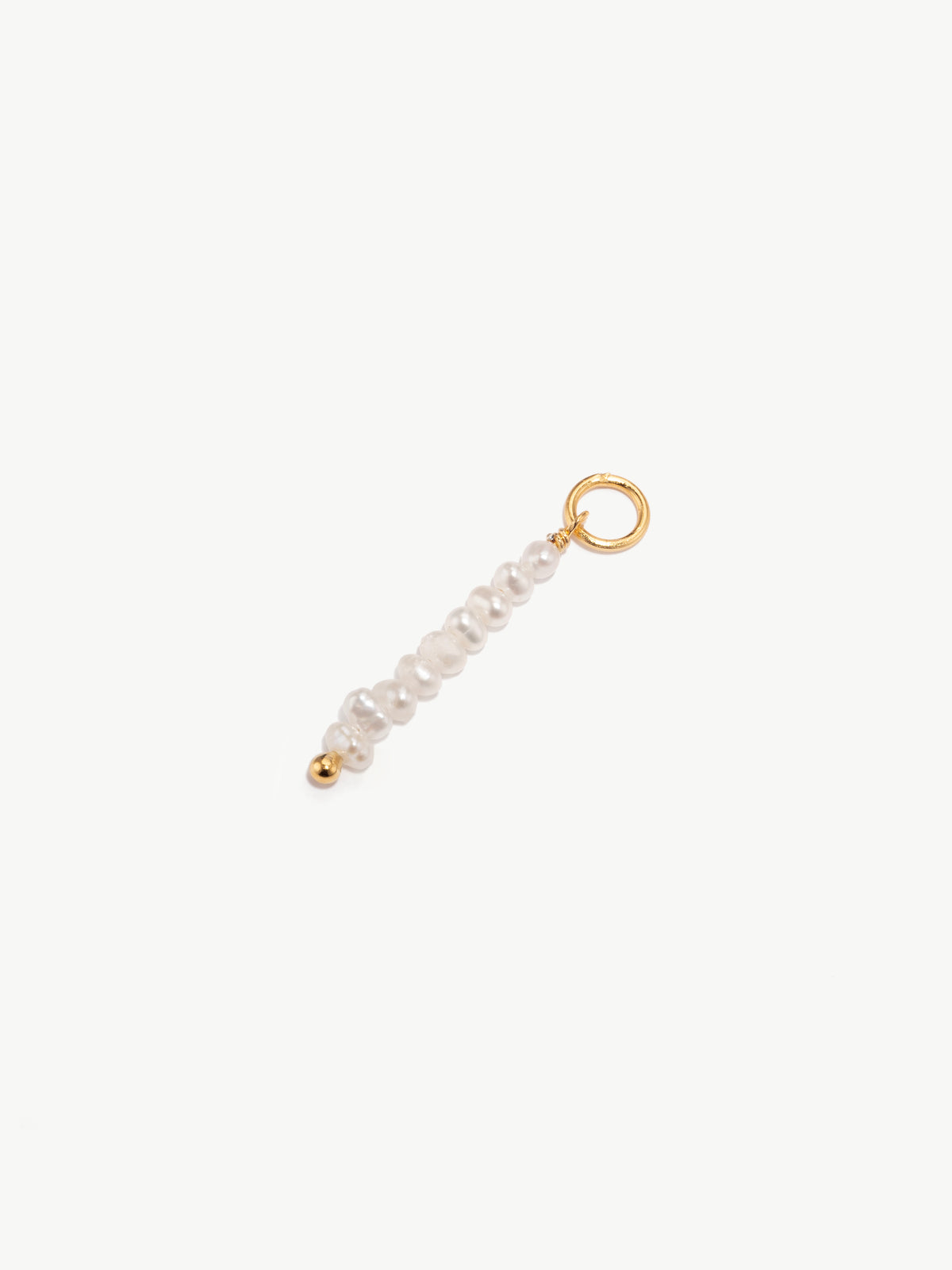 Freshwater pearl charm in gold vermeil