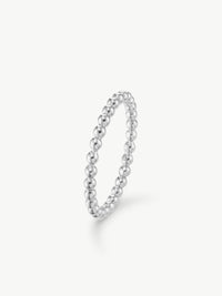 silver ring with beaded design