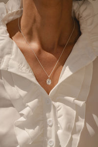 Sapphire pendant and chain in sterling silver on model