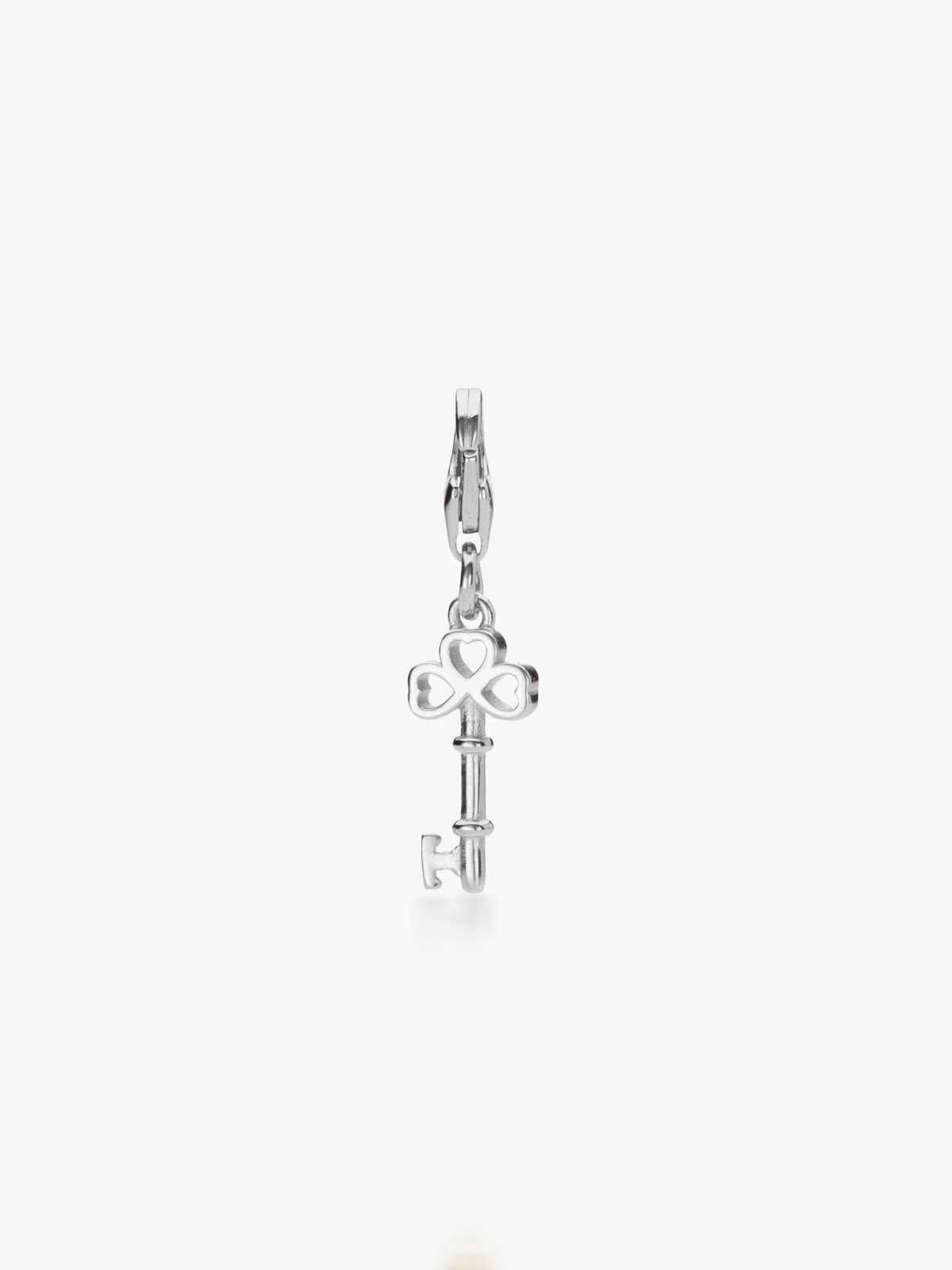 silver key charm