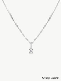 single diamond pendant on chain in sterling silver different angle